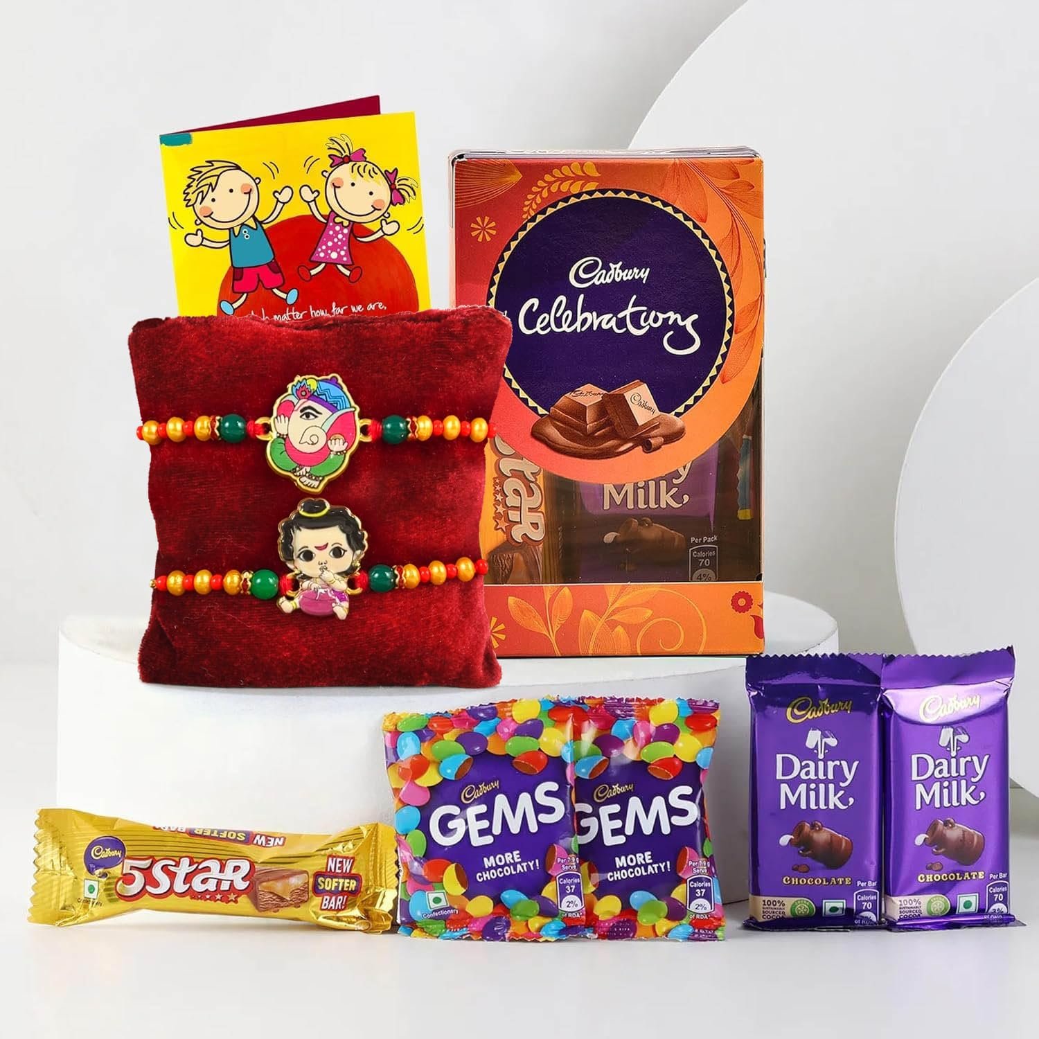 TIED RIBBONS Set of 2 Rakhi for Kids with Chocolates Gift Pack - Krishna and Ganesh Rakhi for Kids Boy with Celebrations Chocolates Greeting Card and Roli Chawal Tikka