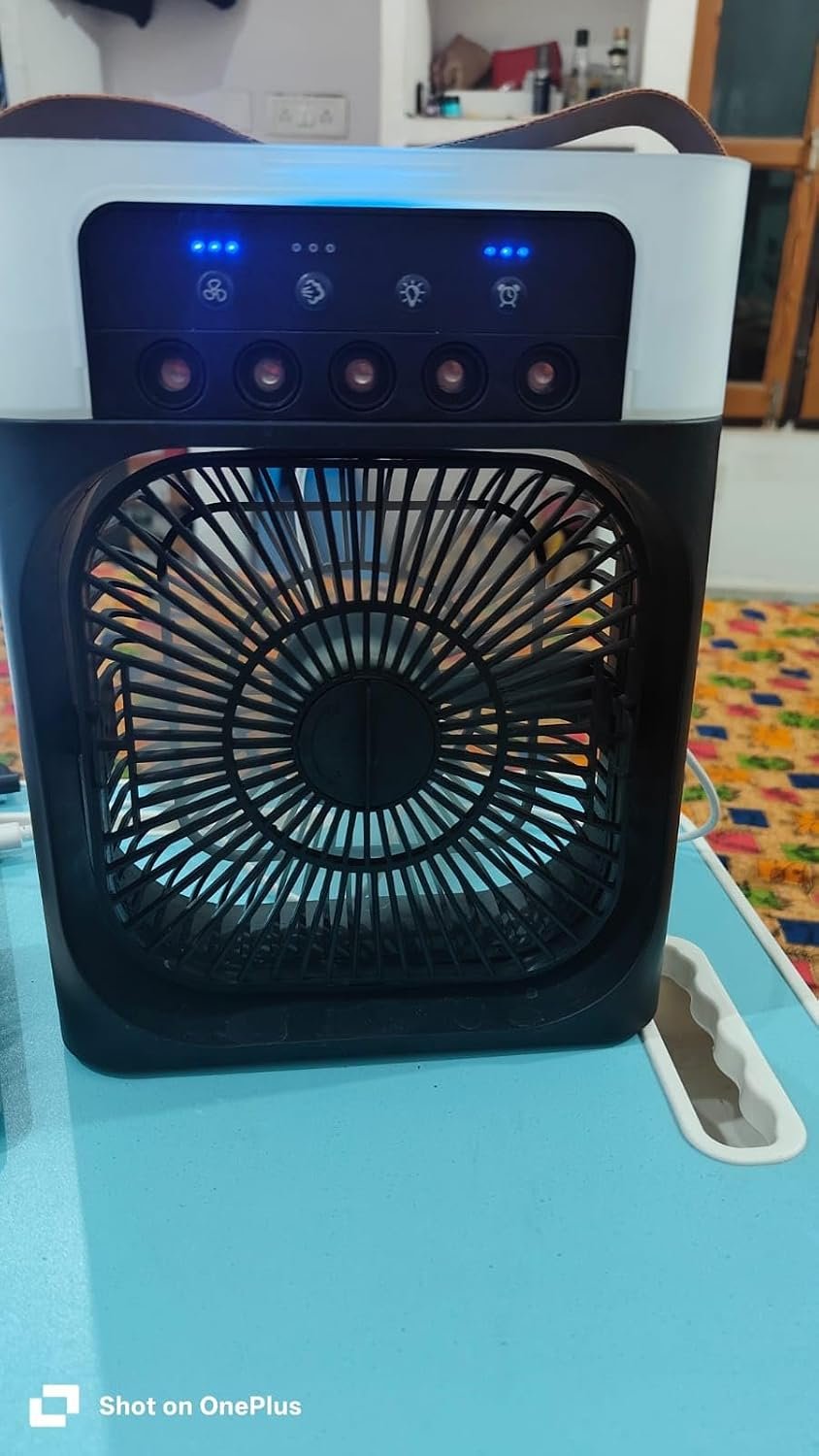 Portable Mini Air Cooler with 7-Color LED Night Light and 3 Spray Modes | Portable USB-powered cooling, quiet operation, adjustable fan speeds, fine mist humidification, compact and energy efficient.