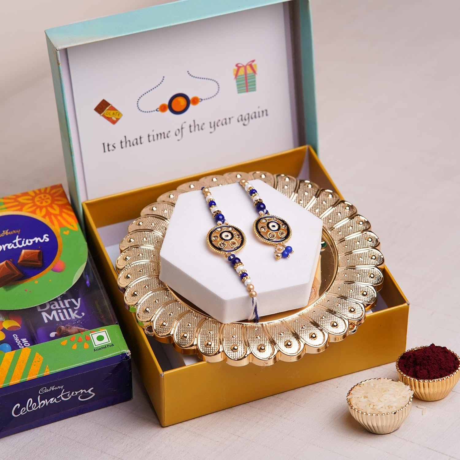 Gifticon Bhaiya Bhabhi Rakhi for Brother and Bhabhi with Chocolate - 1 Pair of Bhaiya Bhabhi Rakhi | 1 Celebrations Pack | 1 Greeting Card | Roli Chawal | Gift Box | IB16