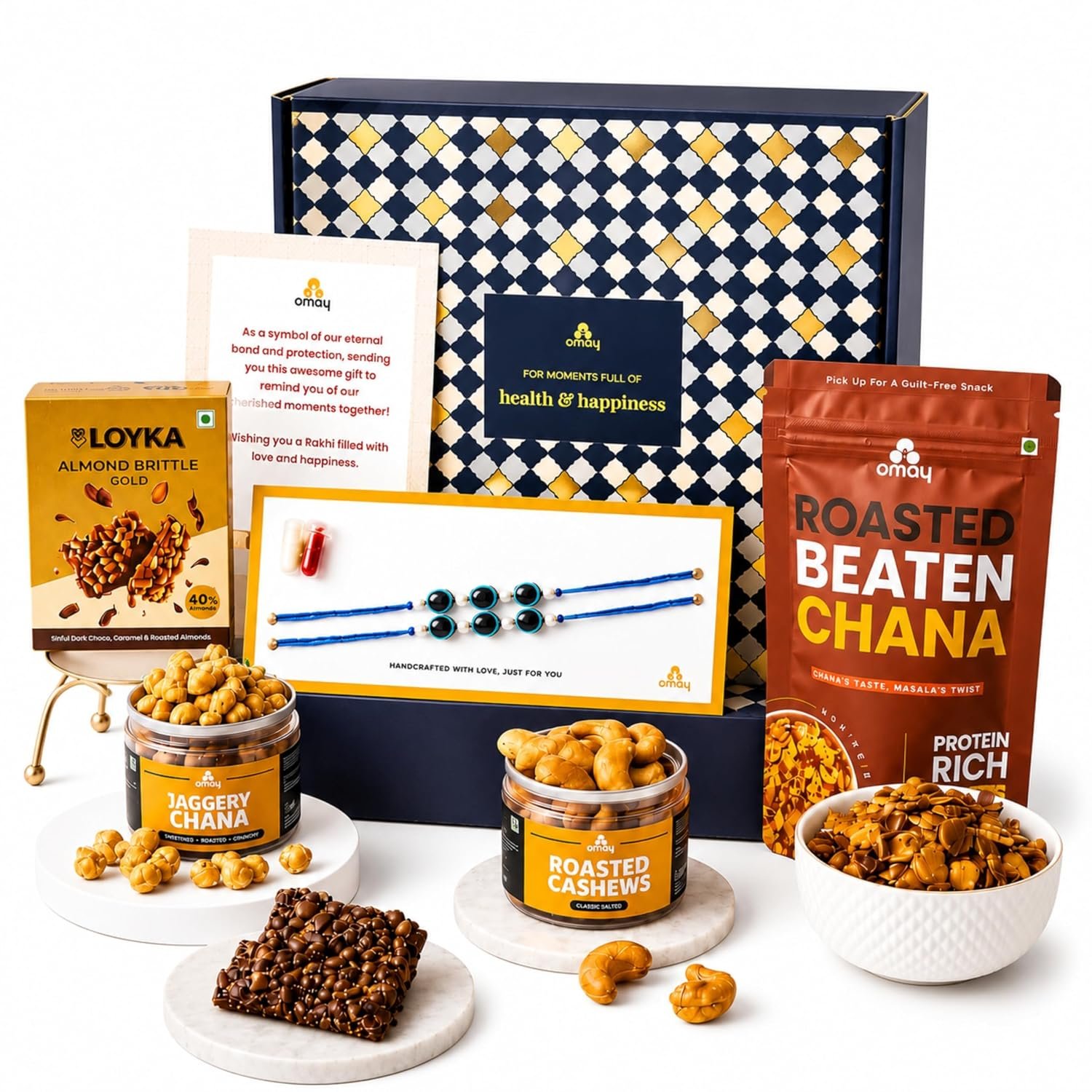 Omay Foods Snack & Celebrate Rakhi Gift Hamper for Brother | 8 Pcs | Healthy Roasted Snacks, Dry Fruits, Chocolate & Handmade Rakhi | Rakhi Box for Bhai and Bhaiya