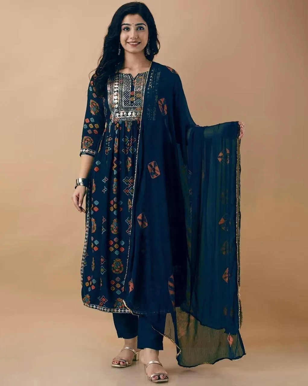 NYRIKA Embroidered Straight Kurta Set -